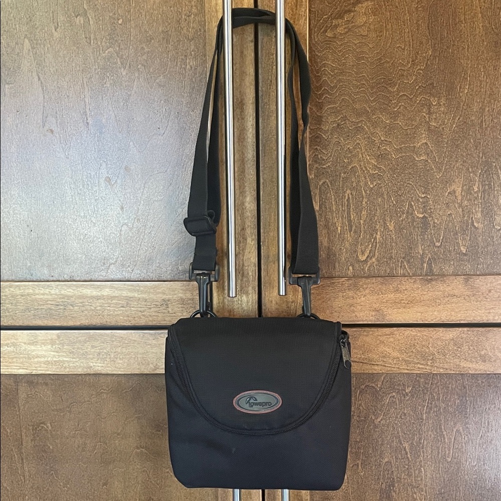 Lowepro camera case with adjustable straps.